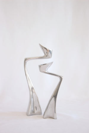 Swan candlestick holders by Matthew Hilton, 1983